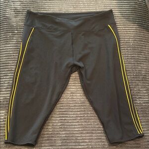 Fabletics Black Capri Leggings with Yellow Stripes